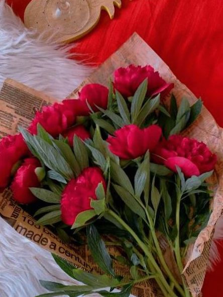 Florist arranging bouquet